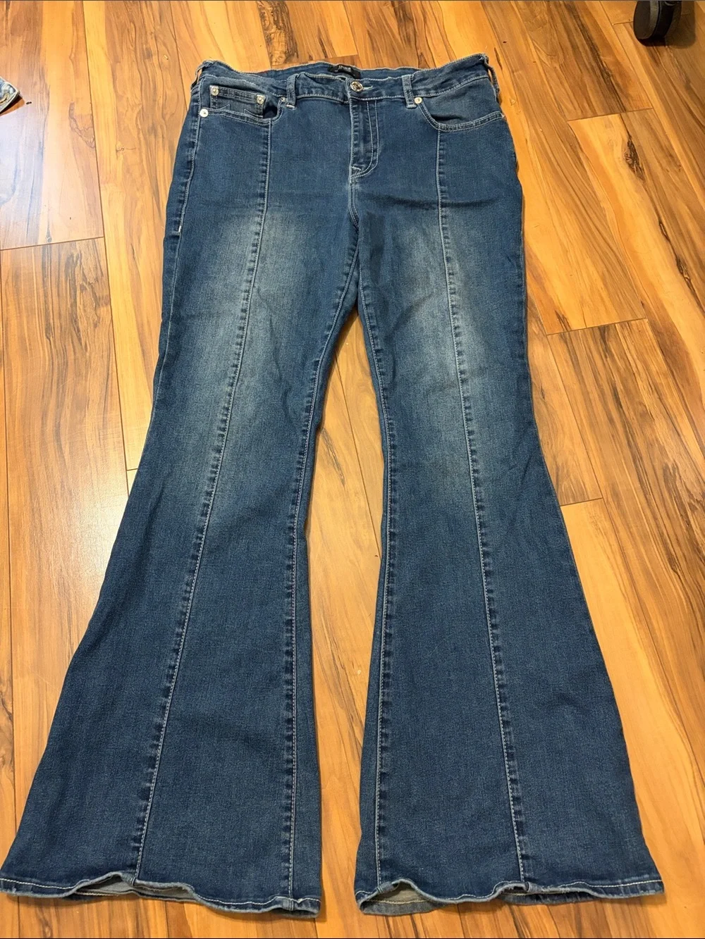 True religion Charlie Indigo Wide-Leg Flare Jeans. Ware at the heel of the pant